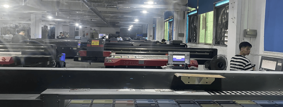 PODJST quality-control team inspecting custom products at a production facility