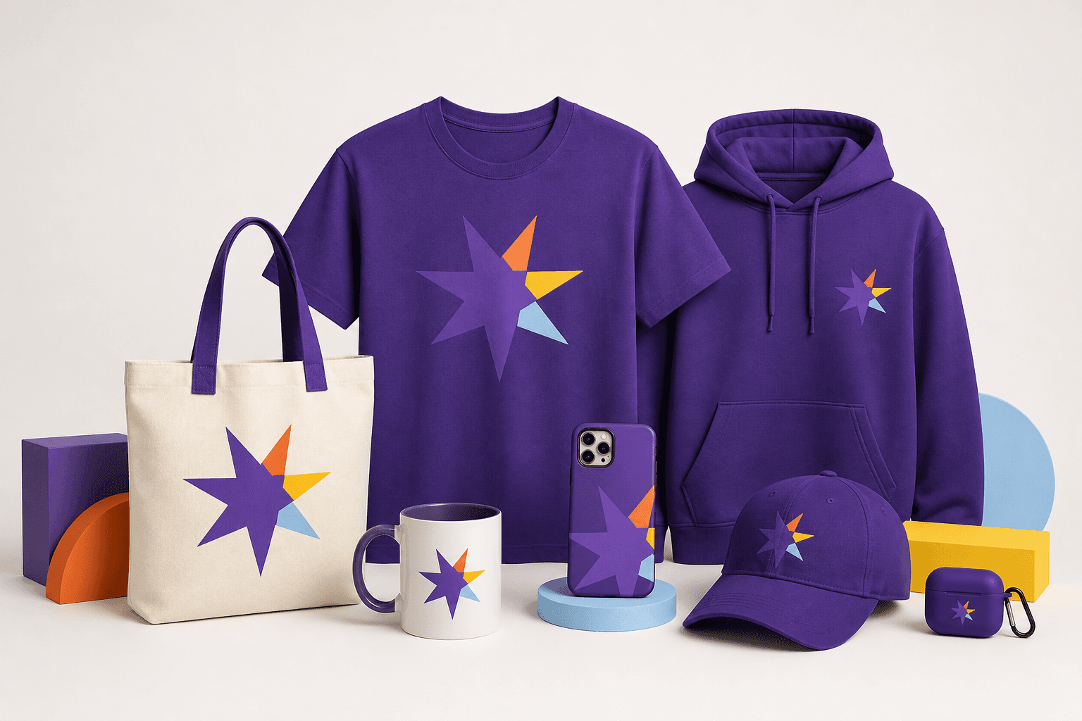 A coordinated custom merchandise collection with apparel, a mug, phone case, tote bag, cap, and earbud case
